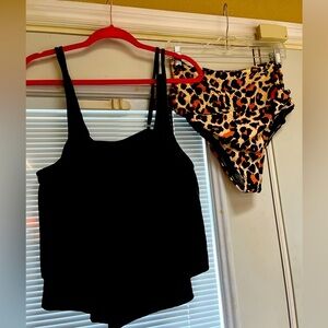 NWT. Two piece bathing suit. Lightly padded.)Hygienic liner still attached.